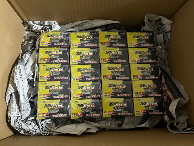 Pokémon boxes packed in a shipping carton